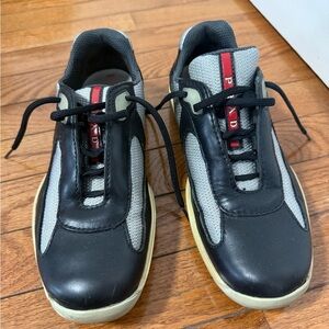 Dark Gray Low-Top Sneakers with Red Accents and White Sole